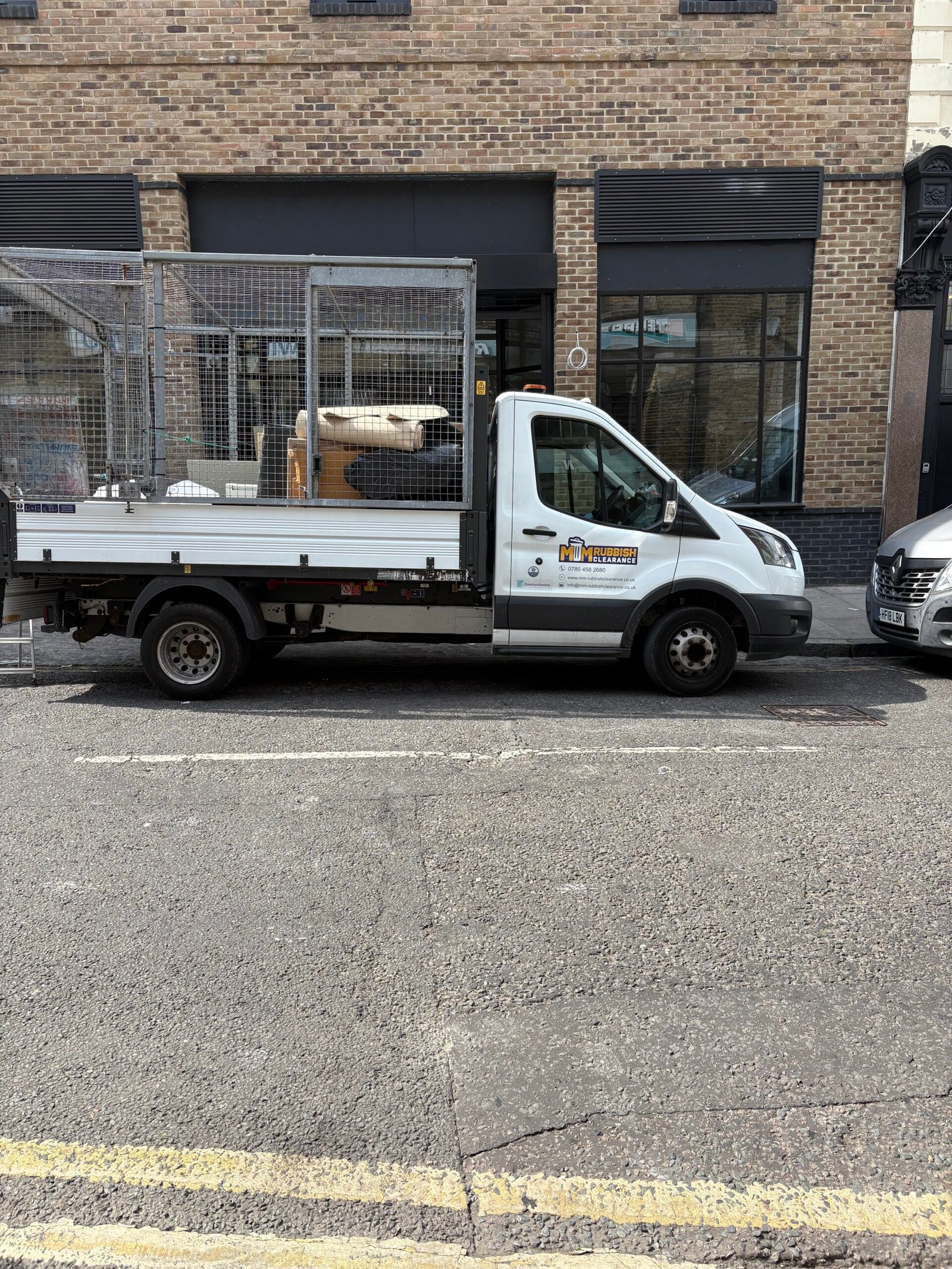 MM Rubbish Clearance van in Dalston E8