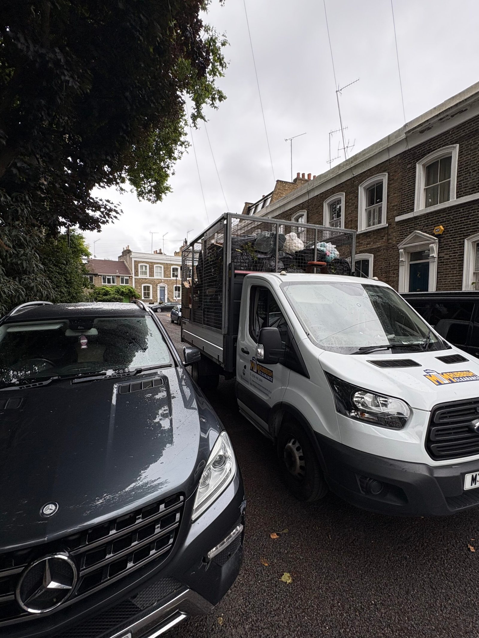 MM Rubbish Clearance van in Islington N1 on a local street