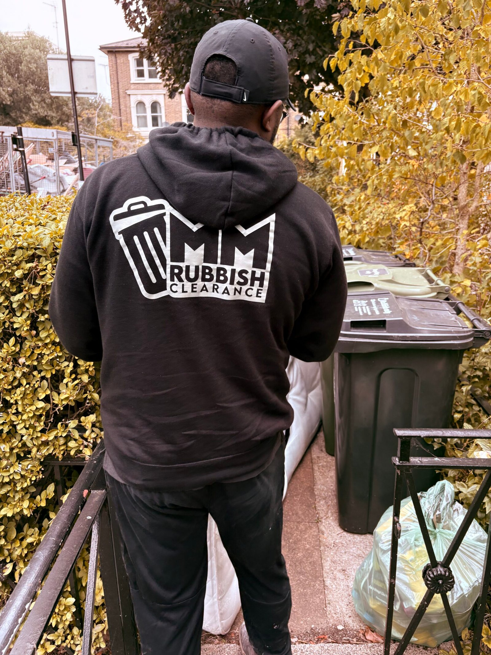 MM Rubbish Clearance team carrying a sofa during a sofa removal in Hackney E8 – professional London service