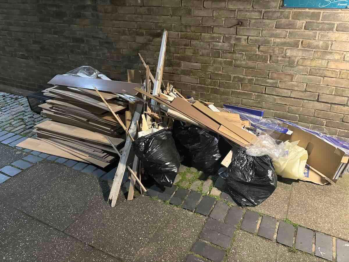 Emergency rubbish clearance in SE16 with mixed waste ready for collection