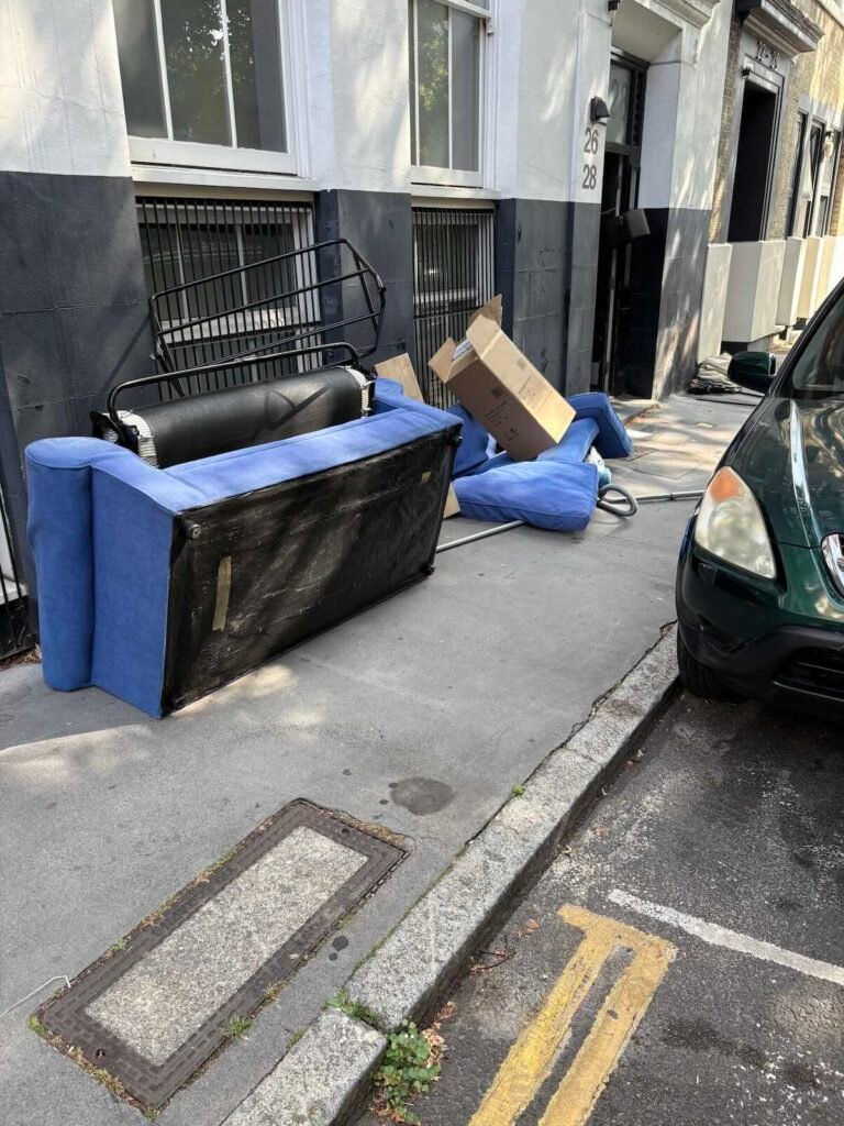 Sofa ready for removal in Old Street EC1