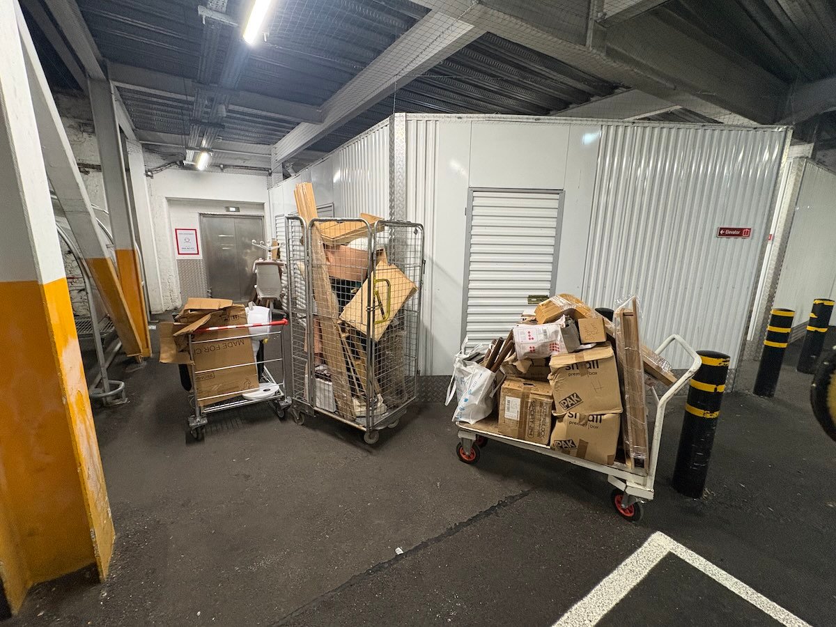 Commercial office clearance before photo in Camden showing cardboard and business waste ready for collection