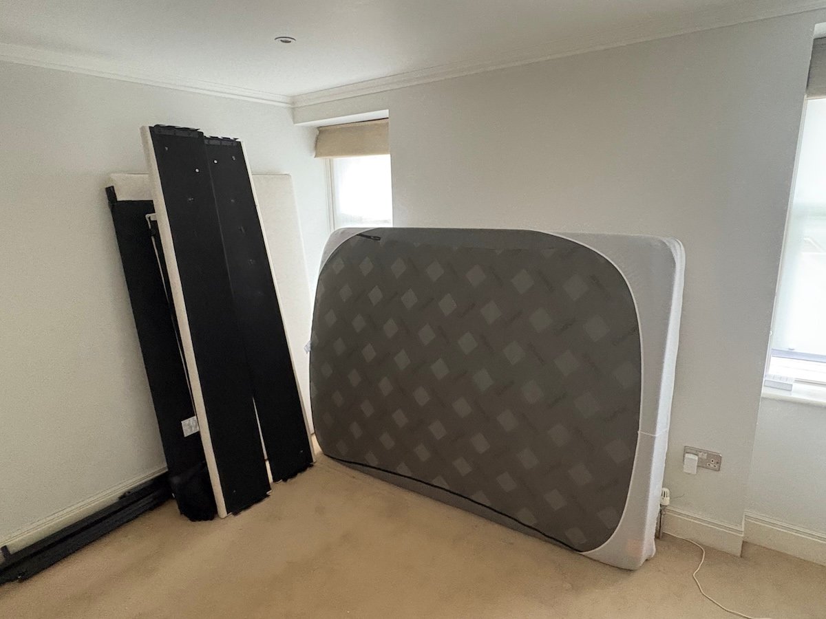 House clearance before — Marble Arch W1 cluttered room