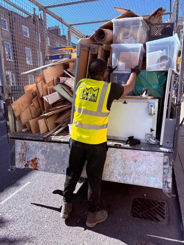 Office waste being loaded into the MM Rubbish Clearance van