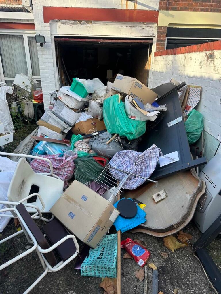 Packed garage in Stoke Newington N16 before clearance