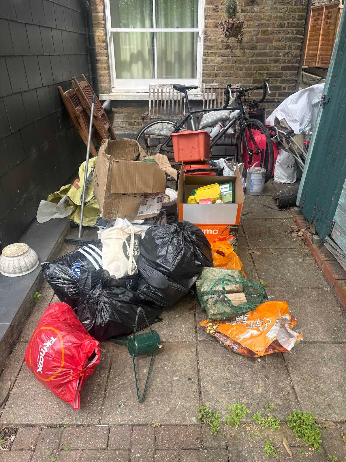Household rubbish at the rear of a house in Harringay, N4 before clearance