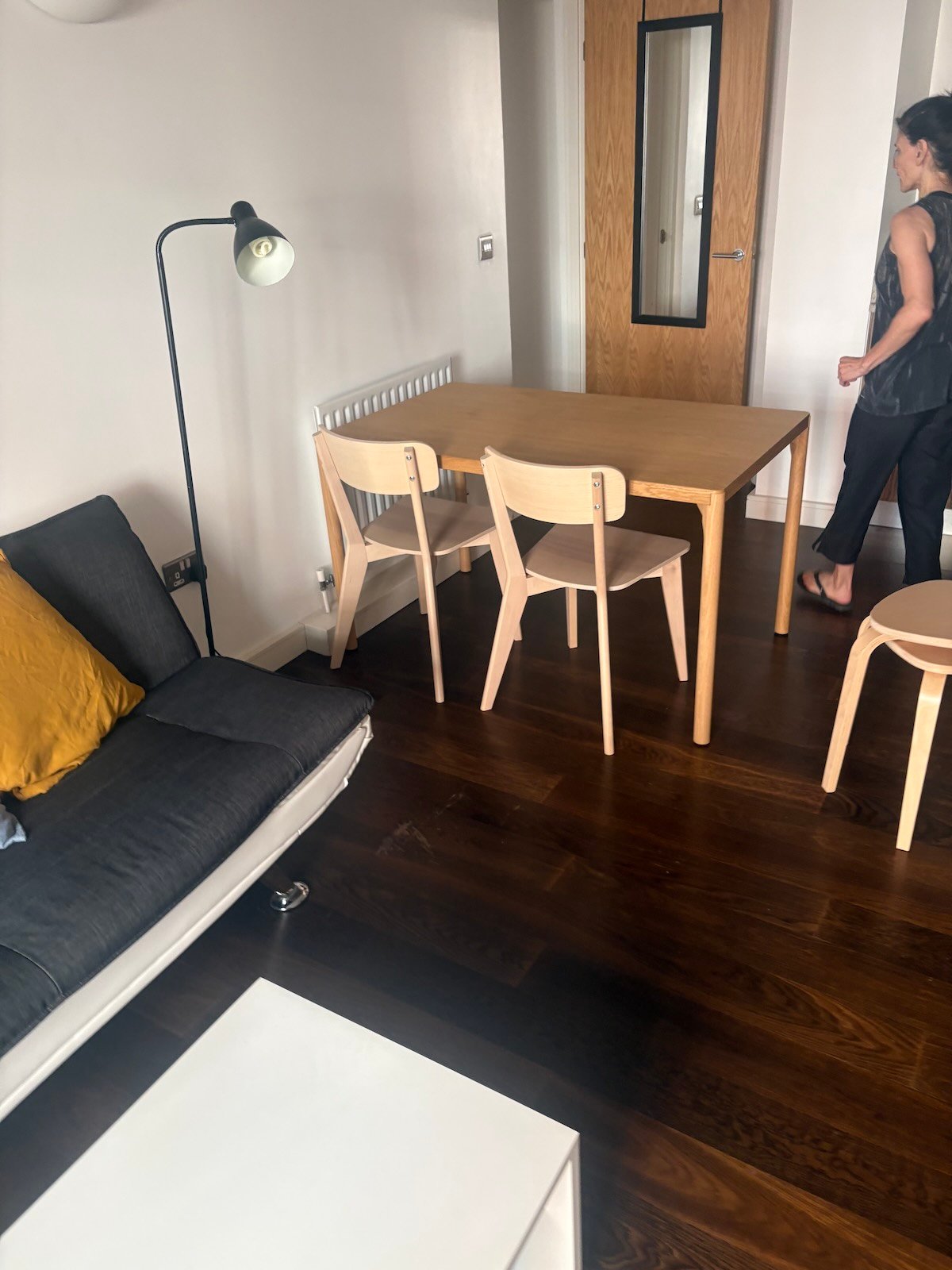 Sofa, dining table, chairs and coffee table in a flat near Elmore Street, Islington N1, before clearance