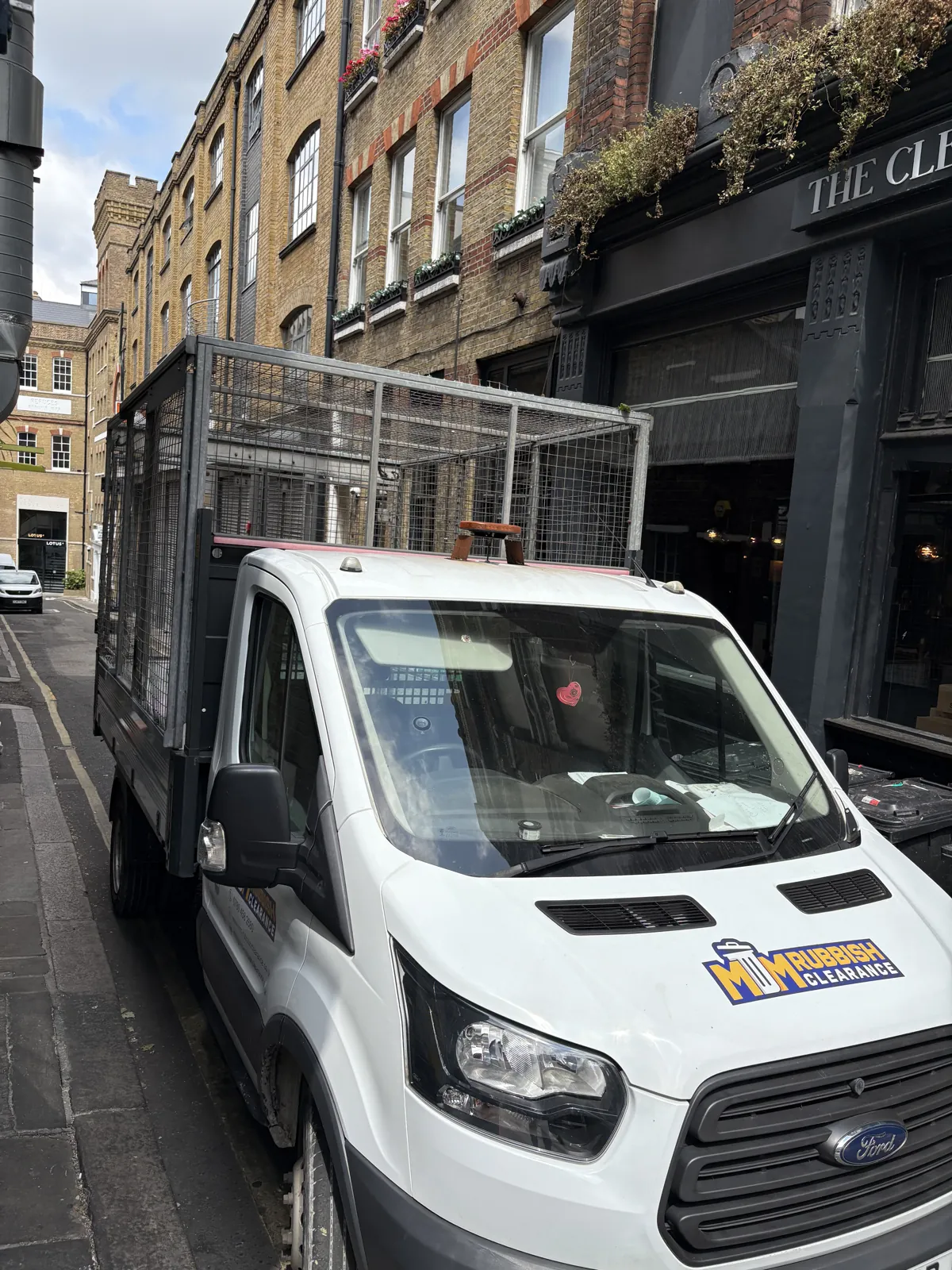 MM Rubbish Clearance truck on Clerkenwell Road, EC1R.